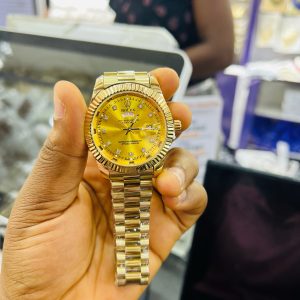 Rolex Gold gold face watch