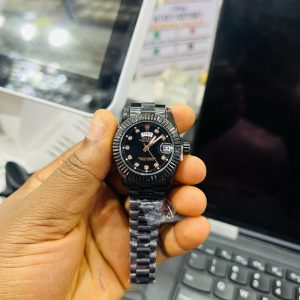 Black female Rolex