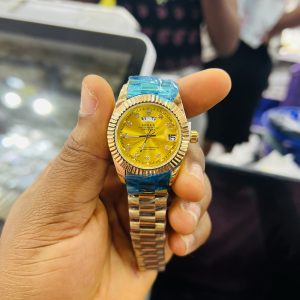 Rolex gold female watch