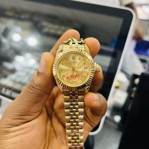 Engraved Rolex female gold face watch with paper box