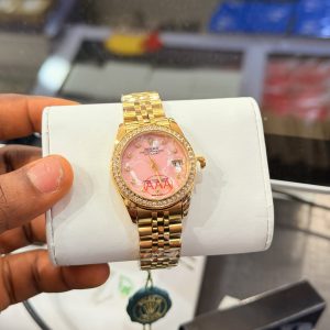 Rolex Gold pink face watch