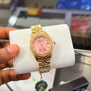 Rolex Gold pink face watch