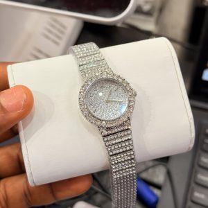 Iced out silver Rolex watch