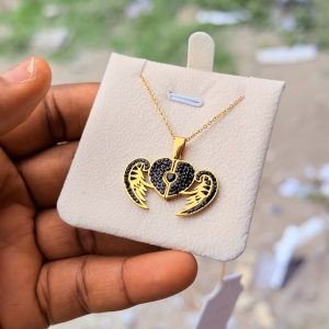 Engraved black winged necklace with box