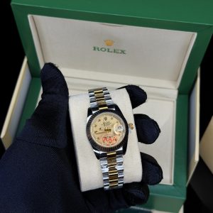 Rolex female gold two toned watch