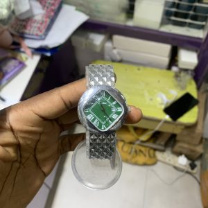 Cartier green face watch