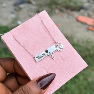 Engraved silver rose necklace