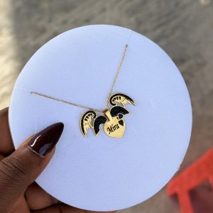 Engraved black winged necklace