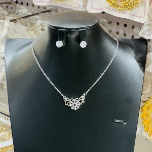 Silver wheel necklace