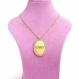 Engraved gold oval stoned necklace