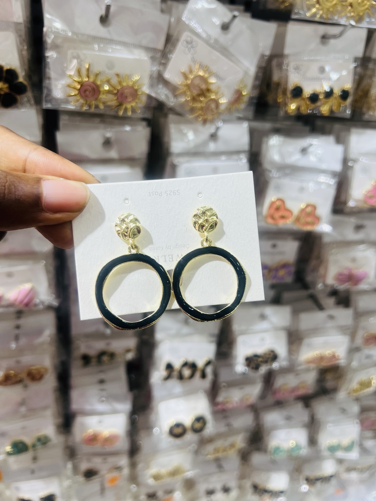 Gold black circle earrings
