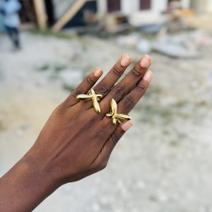 Unequal butterfly ring size (9)