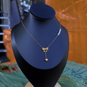 Bow tie beaded steel necklace