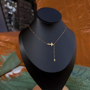Gold cross steel necklace
