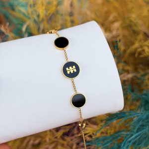 Black Tory Burch steel bracelet