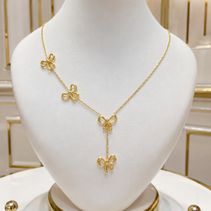 Gold bow tie drop necklace