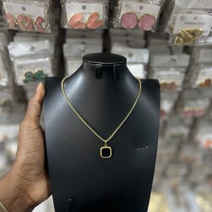 Black square gold necklace