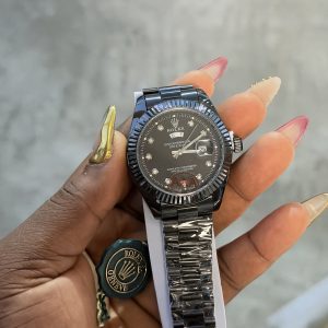 Presidential Black male Rolex watch (day and date)