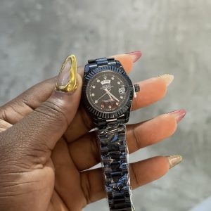Presidential Black female Rolex watch (day and date)