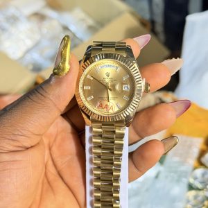 Stoned Gold male Rolex watch (day and date)