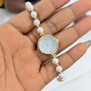 Rebirth pearls gold white face dropping watch