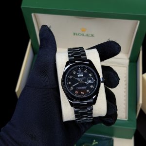 Presidential Black male Rolix watch (day and date)