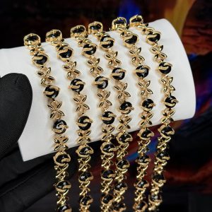 Rq gold black X bracelet