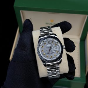 Presidential silver male Rolix watch