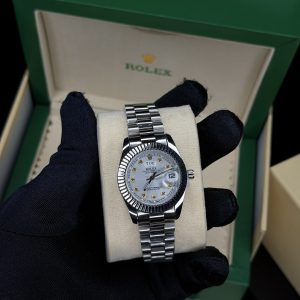 Presidential silver female Rolix watch
