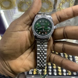 Rolex oyster silver/dark green face