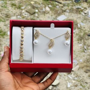 Steel gold swan pearl love stone combo comes boxed 019