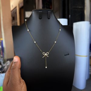 Steel dropping bowtie necklace