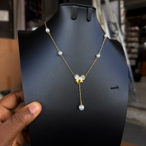 Steel Pearls Bowtie necklace