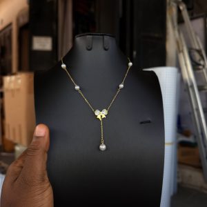 Steel Pearls Bowtie necklace