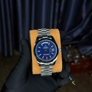 Rolix silver stoned blue face watch