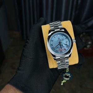 Rolix silver roman blue face watch