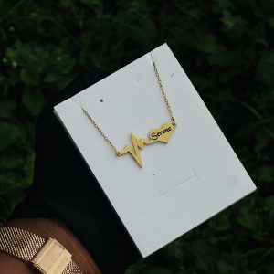 Engraved gold pulse necklace