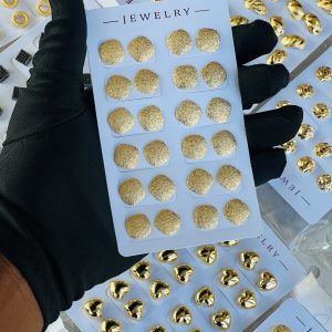Gold earrings. Half pack