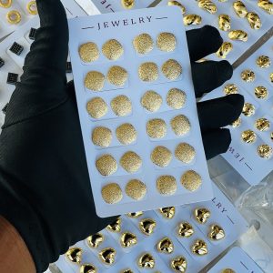 Gold earrings. Half pack