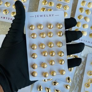 Gold earring . Half pack