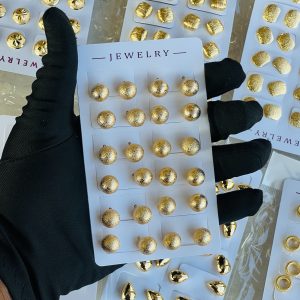 Gold earring . Half pack