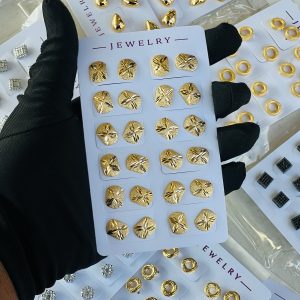 Gold earrings . Half pack