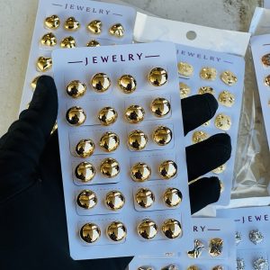 Gold earrings . Half pack