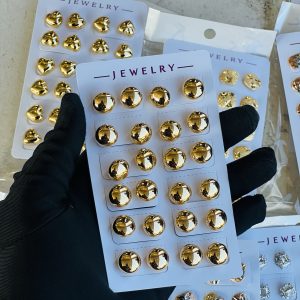 Gold earrings . Half pack