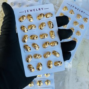 Gold earrings . Half pack
