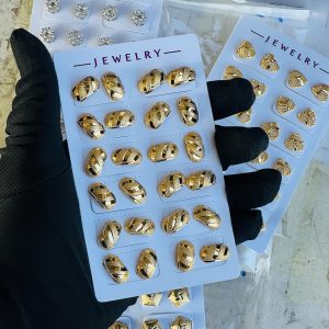 Gold earrings . Half pack