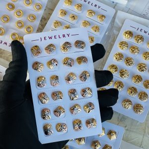 2 toned earrings. Half pack