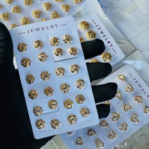 Gold earrings.  Half pack