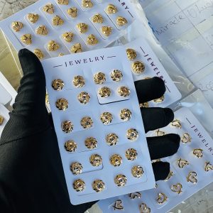 Gold earrings.  Half pack