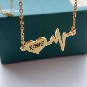 Engraved gold pulse necklace